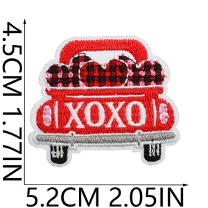 Detail of red truck embroidery patch with heart patterns and XOXO text and dimensions
