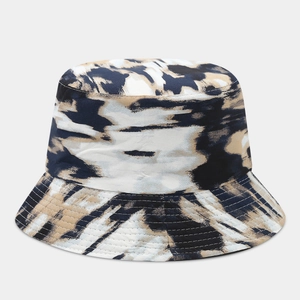 Detail view of tie-dye bucket hat showing marble pattern texture and reinforced stitching