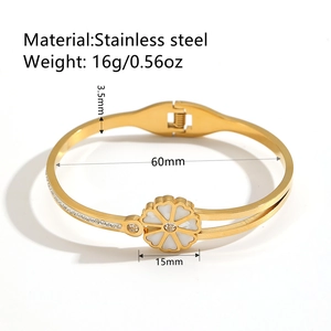 Gold stainless steel double layer flower bangle with white petals and small crystals
