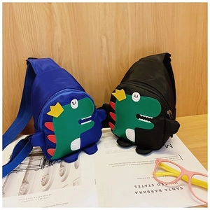 Detailed view of blue and black cartoon dinosaur cross-body bags for kids in nylon fabric