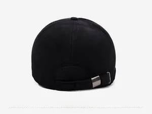 Rear view of black baseball cap showing striped texture and adjustable silver metal buckle