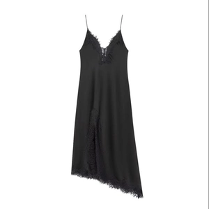 Elegant black silk-satin slip dress with lace trim and asymmetrical hem on white background