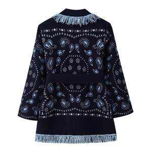 Women's dark blue paisley knit cardigan with fringe trim and matching waist belt