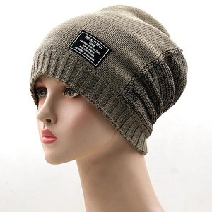 Winter ribbed knit beanie in dark khaki with a decorative patch for men and women