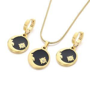 Golden stainless steel jewelry set with black enamel horse and daisy flower charms