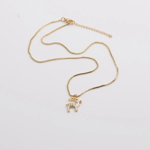 Golden reindeer pendant necklace with colorful enamel inlay on a thin box chain