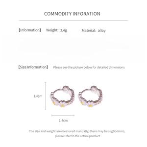 Detailed view of daisy enamel hoop earrings showing dimensions 1.4cm and 3.4g weight