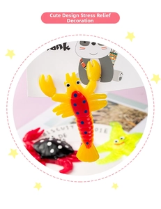 Close-up of cute cartoon lobster, crab and starfish squishy toys for stress relief