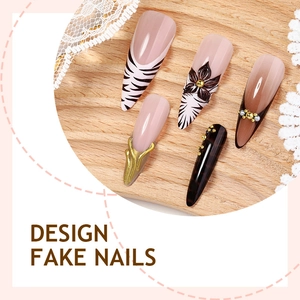 24pcs leopard and floral press-on nails with 3D gold accents on a wooden display