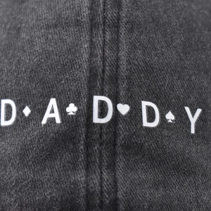 Black washed cotton baseball cap with white DADDY embroidery and playing card suits
