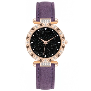 Detail of rose gold cat-themed watch with purple suede strap and starry sky dial decoration