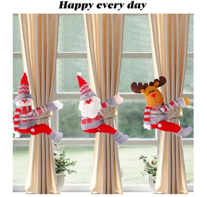 Detailed view of Santa, Snowman and Reindeer curtain tiebacks on champagne fabric