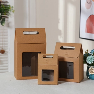 Three kraft paper gift boxes with clear windows in a home setting layout