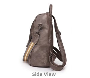 Side view of brown leather backpack featuring detachable woven strap and pebbled texture