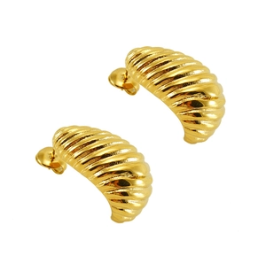 Close-up of gold-plated croissant hoop earrings featuring a vintage 18K spiral texture