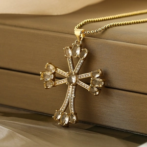 18K gold plated cross pendant necklace with zircon stones on a ball chain jewelry box