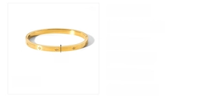 Detail view of 18k gold stainless steel bangle with 6mm width and star pattern