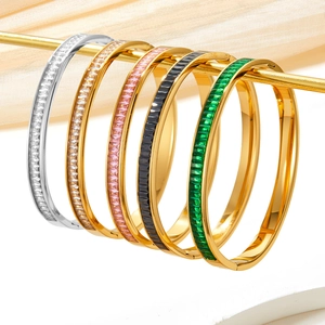 Bracelets élégants en acier doré et argenté avec zircons colorés alignés avec précision