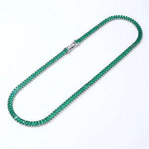 Tennis necklace with green rectangular-cut zircons and a secure silver clasp on white