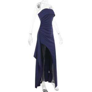 Detailed side view of navy blue tube top dress with waist pleats and side slit