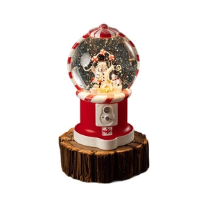Christmas snowman snow globe music box with red and white candy stripes on wooden stand