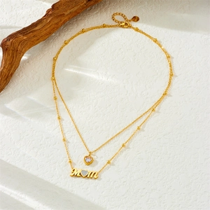 Elegant gold double-layered stainless steel necklace with MOM and heart pendant detail