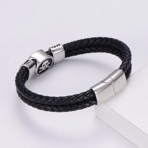 Men's double-layered braided leather bracelet with stainless steel skull magnetic clasp