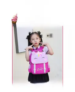 Detail view of pink unicorn school bag with ergonomic straps and mesh side pockets