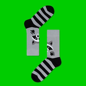 Detailed flat lay of cotton crew socks featuring cute raccoon patterns and grey stripes