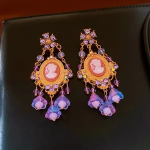 Vintage palace style floral tassel earrings with cameo portrait and purple crystals