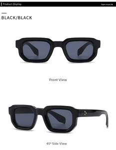 Detail of black rectangular sunglasses with gold flower studs on the temple joints