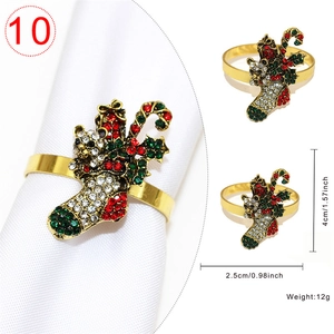 Detailed view of festive Christmas napkin ring with rhinestones and holiday charms