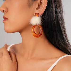 Chic resin hoop earrings with white pompom detail and tortoiseshell texture for women