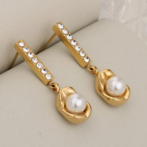 Elegant gold pearl drop earrings with sparkling rhinestones and a polished finish
