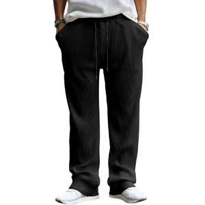 Detail view of black striped drawstring waist and pocket on wide leg casual trousers