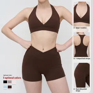 Brown high-stretch yoga set with deep V neck sports bra and cross waist shorts