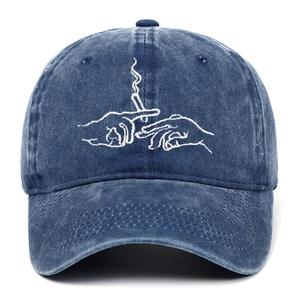 Detailed embroidery on vintage washed denim baseball cap with creative hand design