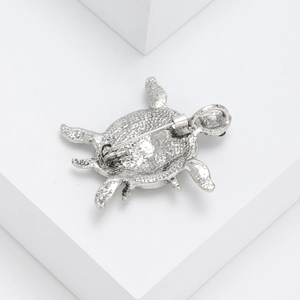 Vintage silver turtle brooch with abalone shell texture and secure pin closure