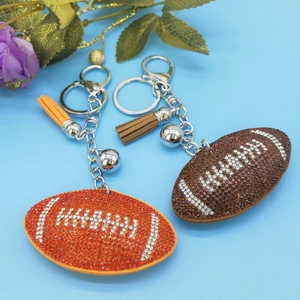 Close-up of sparkling rhinestone rugby keychain with matching tassel and metal ring