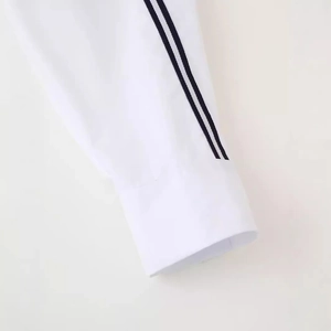 Women's white casual sporty shirt featuring stylish black double stripes on the sleeve cuffs