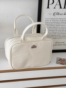 Large cream PU leather vanity case with dual handles and three compartments for travel
