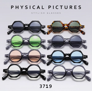 Matrix display of vintage hexagonal sunglasses with metal rivet details in multiple colors