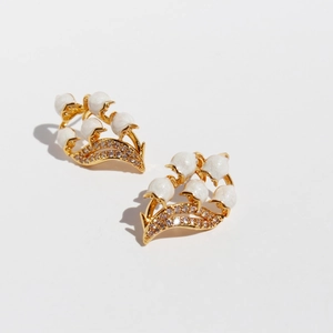 Elegant lily of the valley earrings with white pearls and sparkling zircons in gold