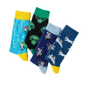 Detail of four colorful mid-calf cotton socks with alien, rabbit, and dog patterns