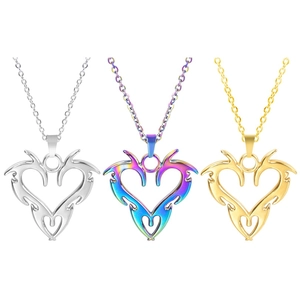 Three tribal heart necklaces in silver, rainbow, and gold finishes on O-chains