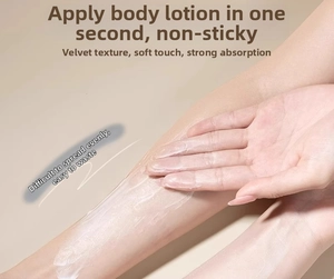 Detailed view of applying body lotion on arm for smooth skin care and sunscreen application