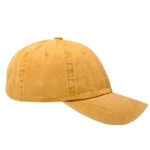 Detail view of ginger yellow washed cotton baseball cap with vintage texture and curved brim