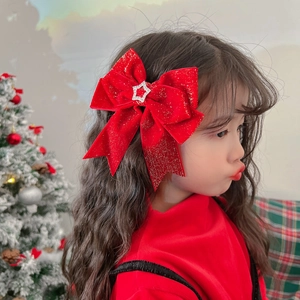 Sparkly red hair bow with star rhinestone for girls festive New Year accessory