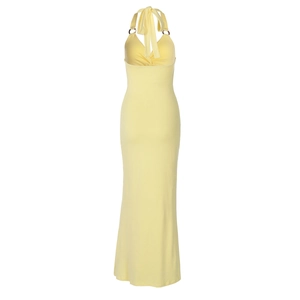Detail of light yellow halter maxi dress with twist-front knot and cut-out detail