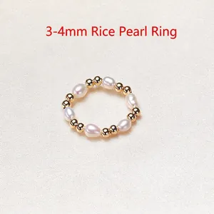 Elastic freshwater pearl ring with 3-4mm rice pearls and golden beads for women